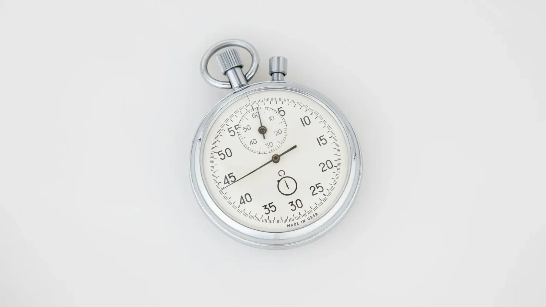 A stopwatch on a white background, used here for measuring Shopify page load times before optimizing