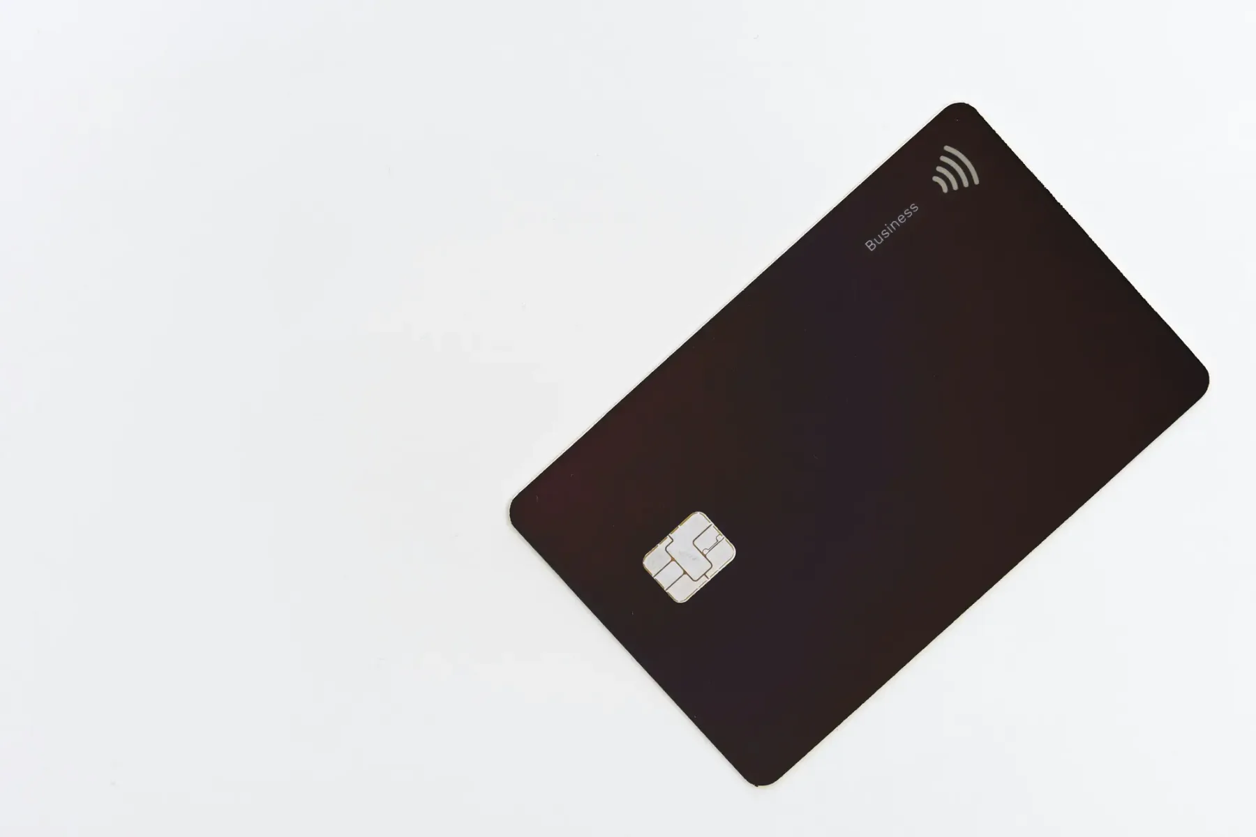 A contactless payment card on a plain background, representing the payment methods a store offers at checkout