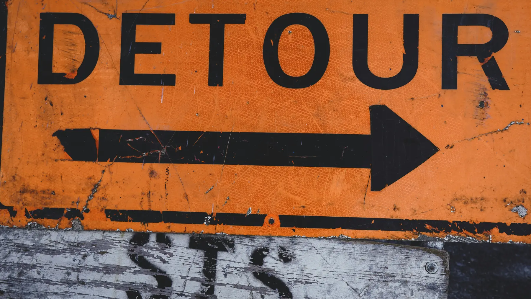 A detour road sign with an arrow, representing the 301 redirect map that sends old URLs to new ones