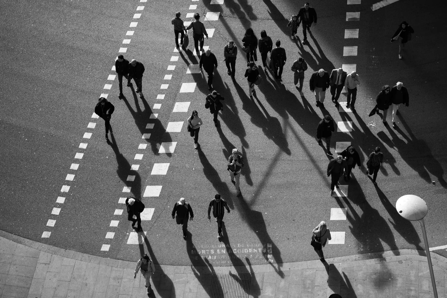 An overhead view of a crowded pedestrian crossing, standing in for store traffic that may not be the right audience